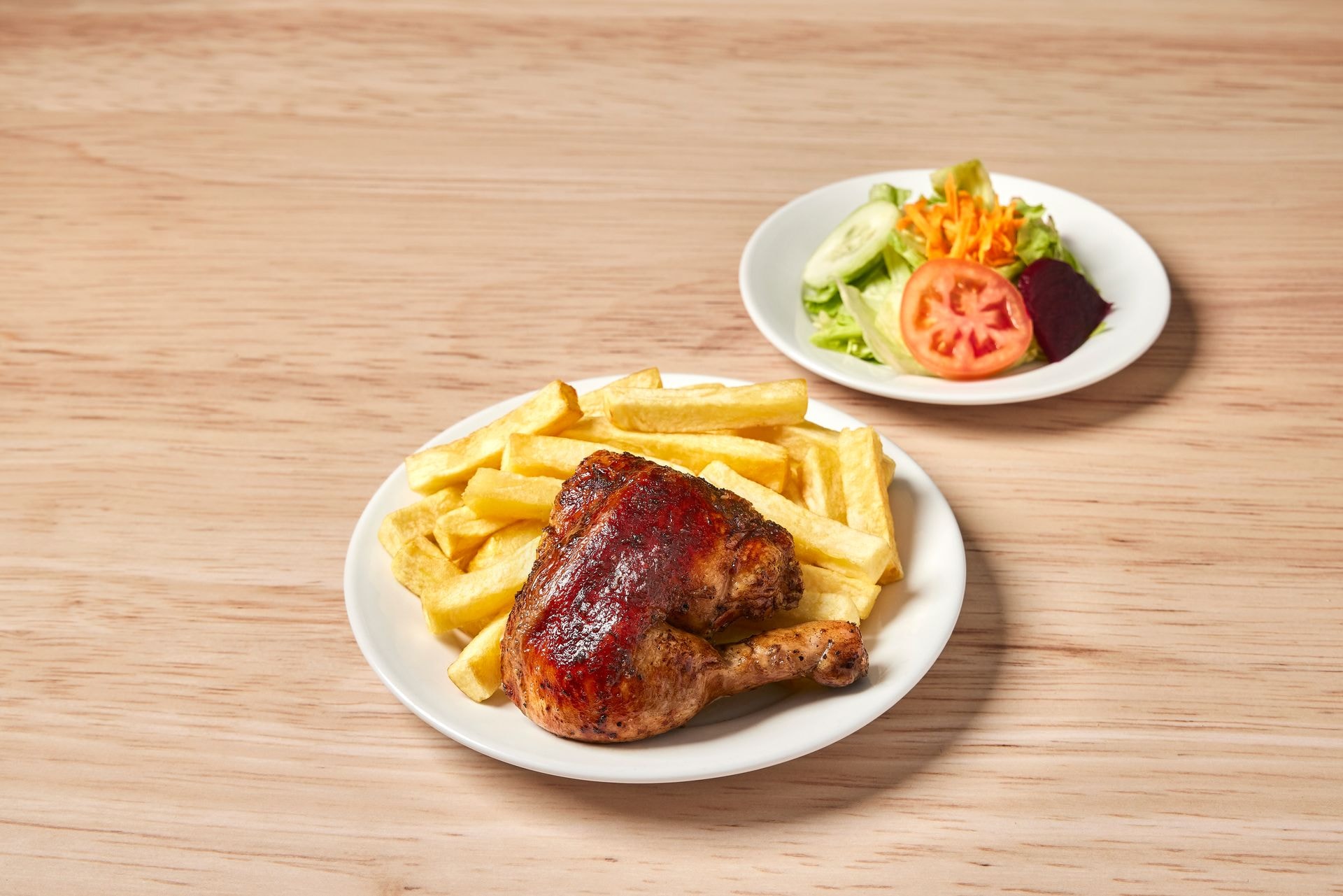 1/4 pollo Norkys + papas+ ensalada