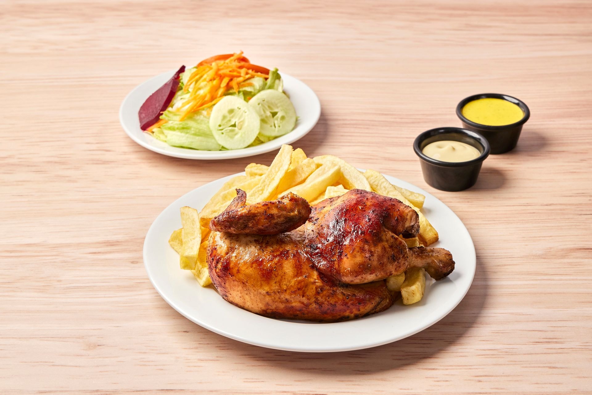 1/2 pollo norkys + papas + ensalada