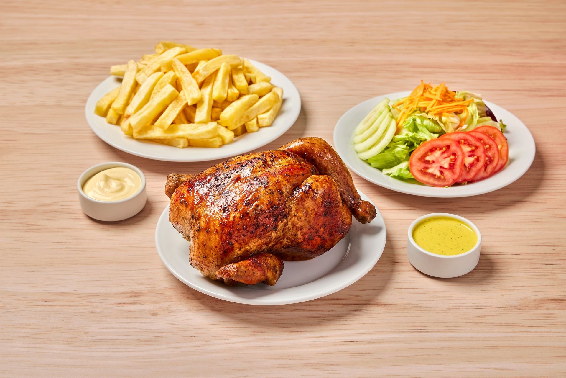 Pollo Norkys + papas + ensalada