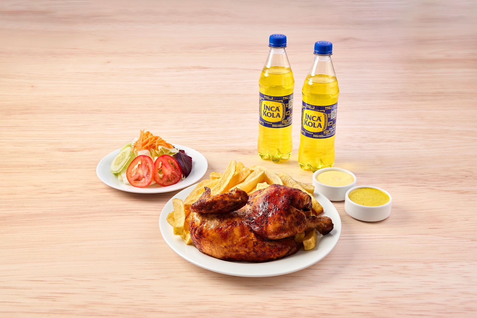 1/2 pollo norkys + papas + ensalada + 2 gaseosas personales